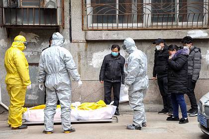 Покойников стали хоронить на камеру из-за пандемии коронавируса - lenta.ru - Сша