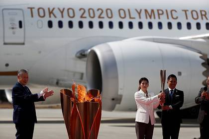 Олимпийский огонь доставили в Японию - lenta.ru - Япония