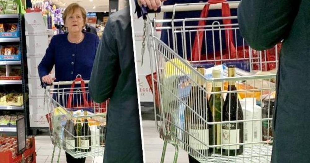 Ангела Меркель - Фото: Меркель застали за покупкой вина и туалетной бумаги в магазине - ren.tv - Германия - Берлин