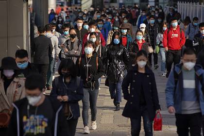 Китай усилил слежку за людьми из-за коронавируса - lenta.ru - Китай
