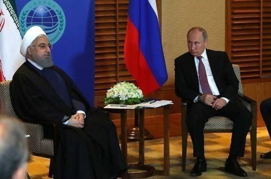 Владимир Путин - Хасан Роухани - Путин и Роухани договорились о совместных действиях по борьбе с COVID-19 - pnp.ru - Россия - Иран