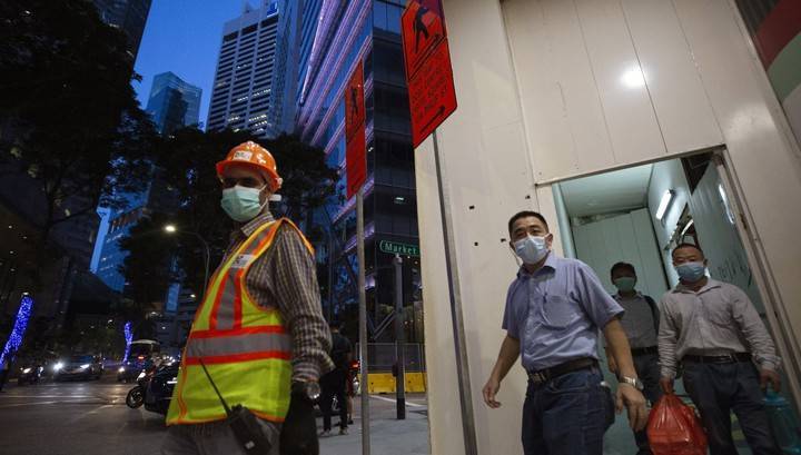 Власти Сингапура заперли на карантин в общежитиях 20 тысяч рабочих - vesti.ru - Сингапур - Республика Сингапур