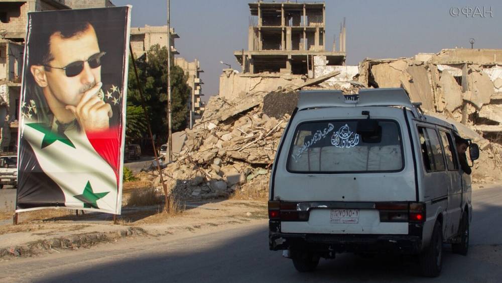 Башар Асад - Сирийцы чествуют Асада за запуск транспортного сообщения после карантина - riafan.ru - Сирия