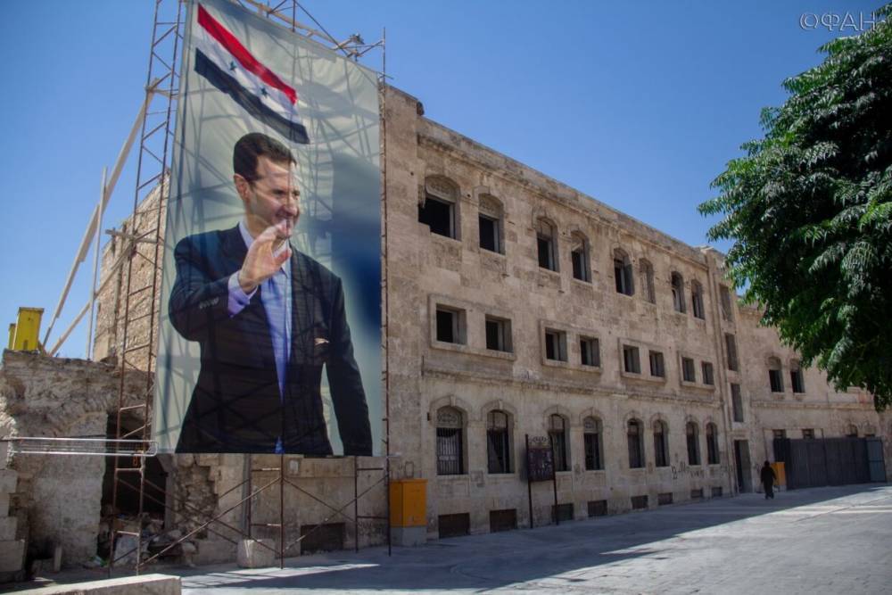 Андрей Кошкин - Асад защищает Сирию от коронавируса, улучшая условия жизни беженцев внутри страны - riafan.ru - Syria