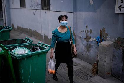 Более 100 миллионов китайцев изолировали из-за новой вспышки коронавируса - lenta.ru - Китай