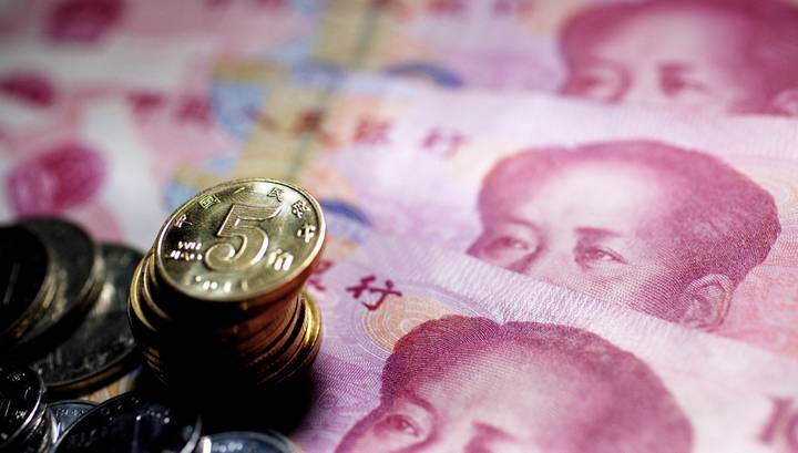 Курс офшорного юаня приблизился к рекордно низкому уровню - vesti.ru - Сша - Китай