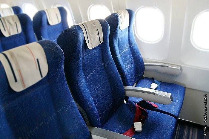 IATA выступила за маски на борту самолета, но против пустых кресел между пассажирами - interfax.ru - Москва