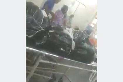 В Индии зараженных коронавирусом в больнице положили рядом с трупами - lenta.ru - Индия