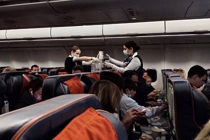 Требование об антивирусной рассадке пассажиров к авиакомпаниям отменили - lenta.ru - Россия