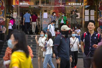Угроза коронавируса в Китае опустилась до минимального уровня - lenta.ru - Китай