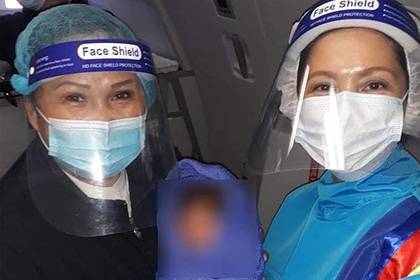 Стюардессы приняли роды в полете во время пандемии коронавируса - lenta.ru - Филиппины - Манила