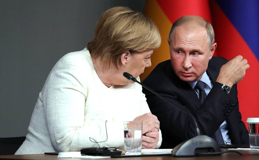 Владимир Путин - Ангела Меркель - Меркель позвонила Путину - tvc.ru - Россия - Украина - Сирия - Ливия