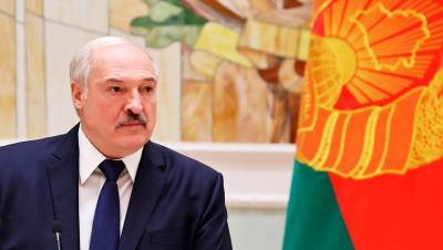 Александр Лукашенко - Лукашенко назвал коронавирус ширмой, за которой пытаются переделить мир - gazeta.ru - Белоруссия