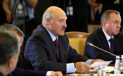 Александр Лукашенко - Лукашенко назвал коронавирус ширмой, за которой делят мир - nakanune.ru - Белоруссия