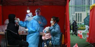 В Китае объявили о тестировании нескольких миллионов людей из-за вспышек коронавируса в трех городах - nv.ua - Сша - Китай - Шанхай - Тяньцзинь