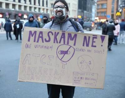 В Риге прошла акция протеста против ограничений, связанных с коронавирусом - argumenti.ru - Латвия - Рига
