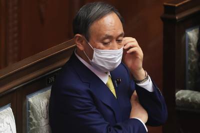Есихидэ Суг - Премьера Японии уличили в нарушении коронавирусных правил - lenta.ru - Япония