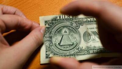 Доллар вырос в цене на открытии торгов Мосбиржи - riafan.ru - Москва