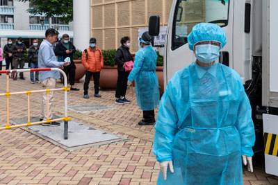 В Китае целый город-миллионник протестируют на коронавирус - lenta.ru - Китай