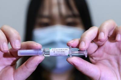 Китай одобрил выход на рынок своей вакцины от коронавируса - runews24.ru - Китай