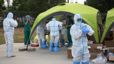 За сутки в КНР выявлено 26 случаев заболевания коронавирусом - russian.rt.com - Китай