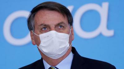 Суд обязал президента Бразилии носить маску в общественных местах - russian.rt.com - Бразилия