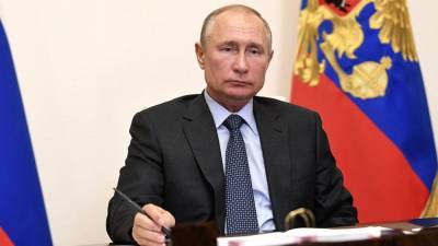 Владимир Путин - Путин назвал помощь россиянам основной задачей в условиях пандемии - riafan.ru - Россия - Москва