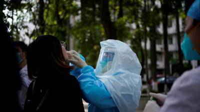 В Китае за сутки коронавирус выявили у 33 новых носителей - russian.rt.com - Китай - Пекин