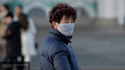 Китаянке понадобилась минута для того, чтобы заразить коронавирусом 70 человек в лифте - nation-news.ru - Китай