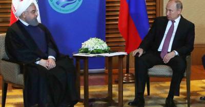 Владимир Путин - Хасан Роухани - Путин и Роухани обсудили усилия по борьбе с COVID-19 - ren.tv - Россия - Иран