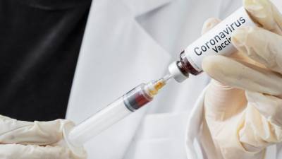 В Китае завершили второй этап испытаний вакцины от COVID-19 - gazeta.ru - Англия - Китай
