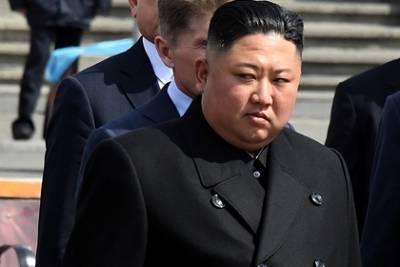 Ким Ченын - Ким Чен Ын объяснил отсутствие заражений коронавирусом в КНДР - lenta.ru - Кндр
