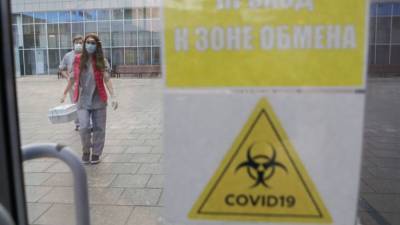 В России выявили 5057 случаев коронавируса за сутки - riafan.ru - Россия - Москва