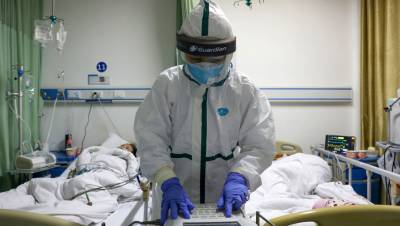 В Китае за сутки выявлено 12 случаев коронавируса - gazeta.ru - Россия - Китай