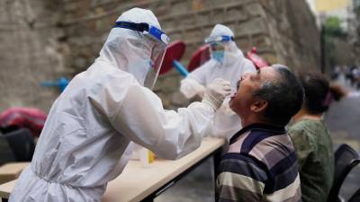 В Китае выявили 57 случаев инфицирования коронавирусом за сутки - russian.rt.com - Китай - район Синьцзян-Уйгурский