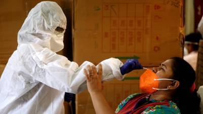 В Индии за сутки зафиксировано более 97 тысяч случаев коронавируса - russian.rt.com - Россия - Индия