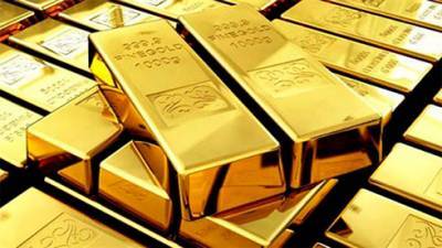 Цена на золото колеблется 12 января на укреплении доллара и рисках из-за COVID - bin.ua - Украина - Нью-Йорк