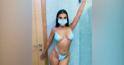 Звезду реалити-шоу осудили за фото в бикини из медицинских масок - ren.tv