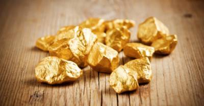 Цены на золото выросли благодаря слабому доллару - minfin.com.ua - Украина - Сша