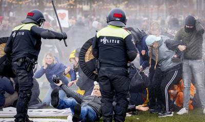 В Голландии митинги против локдауна и комендантского часа переросли в беспорядки - og.ru - Голландия - Амстердам