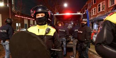 Столкновения с полицией и взрывы автомобилей: в Нидерландах продолжаются беспорядки из-за локдауна - nv.ua - Голландия - Амстердам