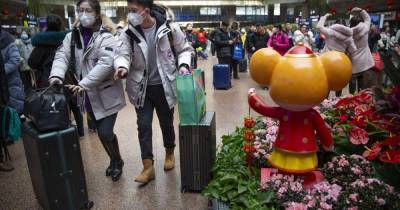 Власти Китая будет платить гражданам по 155 долларов за новогодние каникулы дома - tsn.ua - Китай