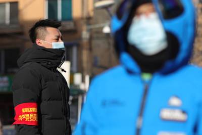 Жителей двух китайских городов призвали не выходить из дома из-за коронавируса - lenta.ru - Китай