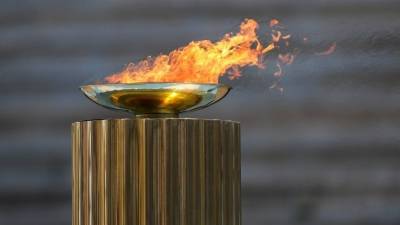 В Китае встретили Олимпийский огонь зимних Игр 2022 года - 5-tv.ru - Китай - Греция - Пекин