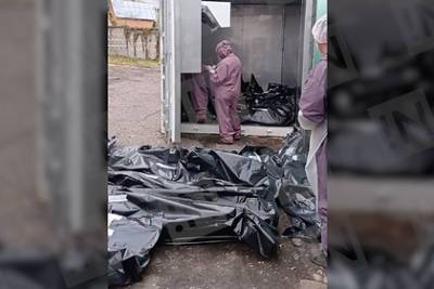 Лежащие на земле пакеты с трупами в российском городе объяснили - lenta.ru - Россия