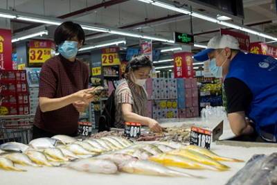 В Китае нашли коронавирус в упаковках с морепродуктами из России - lenta.ru - Россия - Китай