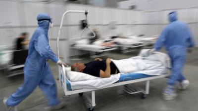 В России впервые от COVID-19 умерли более 900 человек за сутки - svoboda.org - Россия - республика Крым