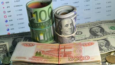 Зимний настрой: как могут измениться курсы доллара и евро в декабре - russian.rt.com - Россия - Сша