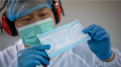 В Японии создали защитную маску, которая светится при контакте с коронавирусом - usa.one - Сша - Япония