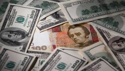 Гривна против доллара. Упадет ли обменный курс в 2022 году и чего ждут в банках - bin.ua - Россия - Украина